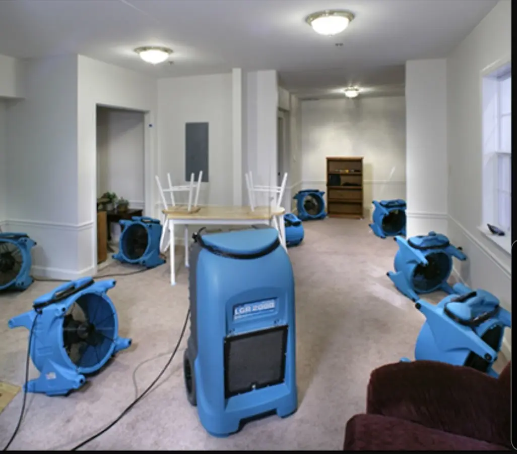 Air movers and dehumidifier setup for Water Extraction & Removal in Wall